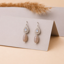 Hook Earings In Zercon With Silver Rhodium Finish With Peach Moonstone Drop